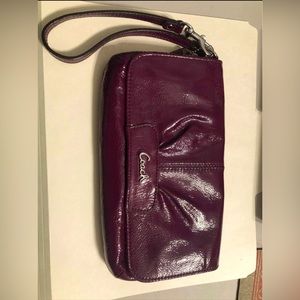 Coach patent eggplant color wristlet